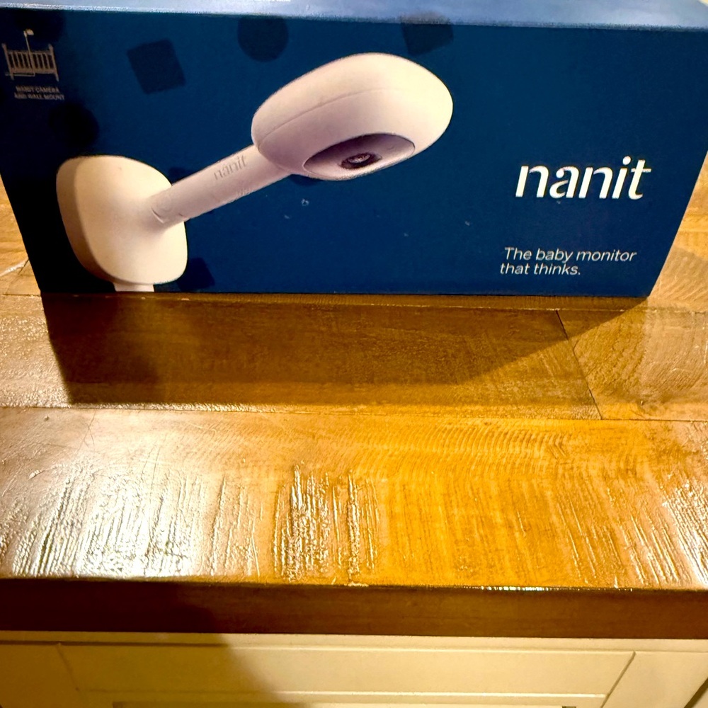 Nanit Baby Camera ( baby monitor that thinks and mounts to wall. )